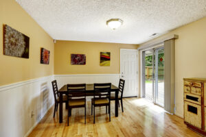 An attractive dining room with patio doors.